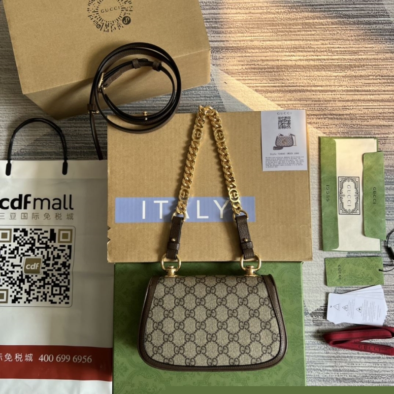 G*u*i top handle bags